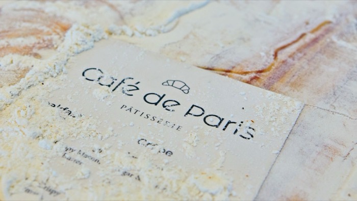 Café de Paris branded paper and packaging