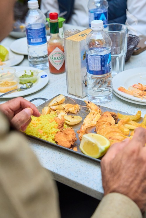 A plate photographed on a phone at an Ocean Basket Sunday shoot